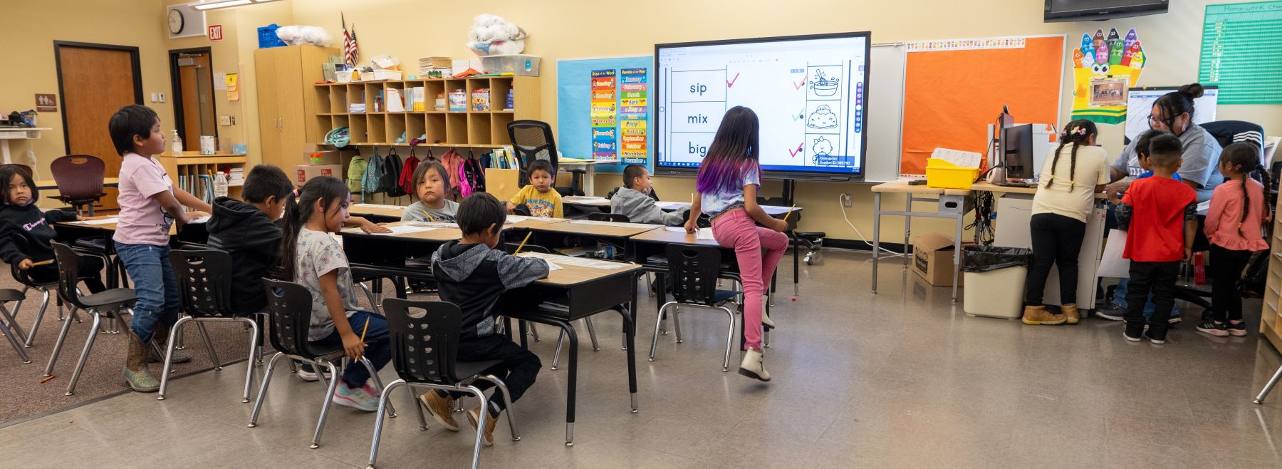 Students working on assignments in class.