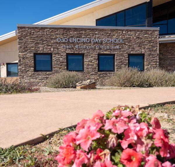 Ojo encino day school building, showcasing its impressive entrance and inviting atmosphere.